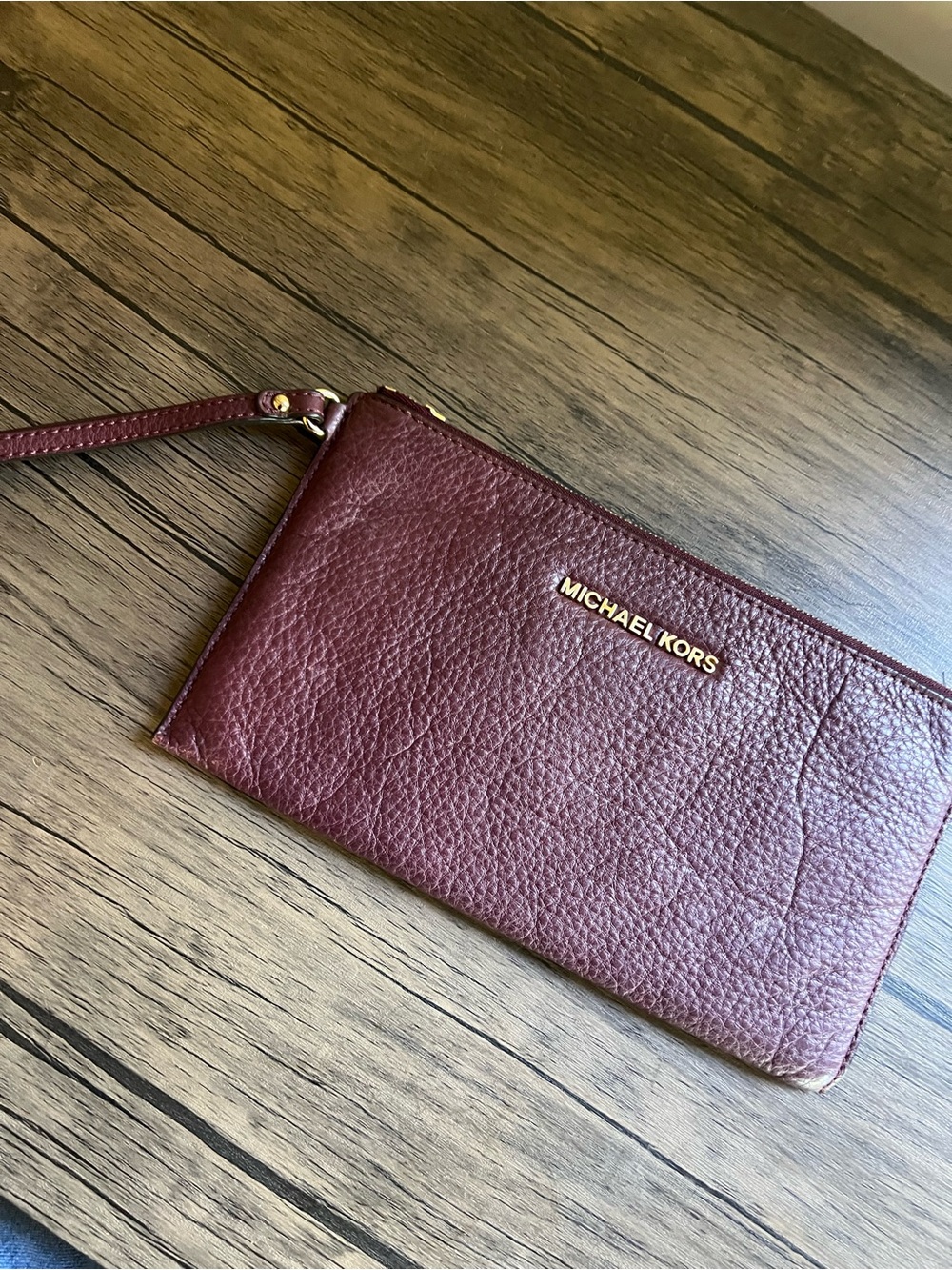 Michael Kors Maroon Pebbled Leather Wristlet with Gold Logo